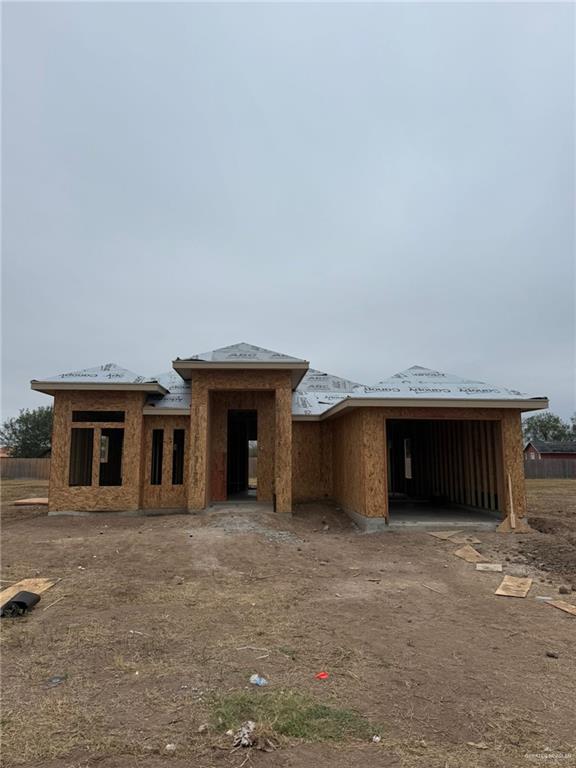 a view of a house with a garage