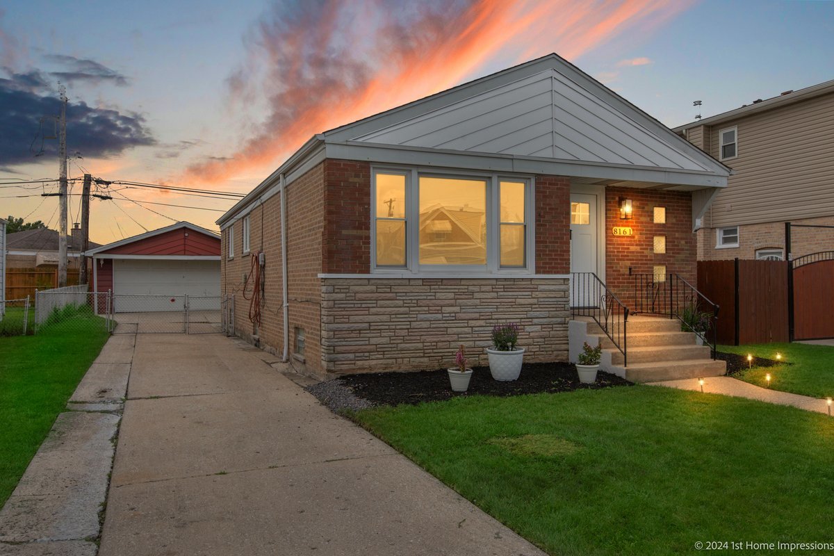 a front view of house with yard