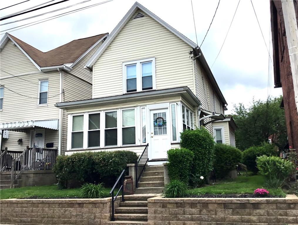 a view of house with street