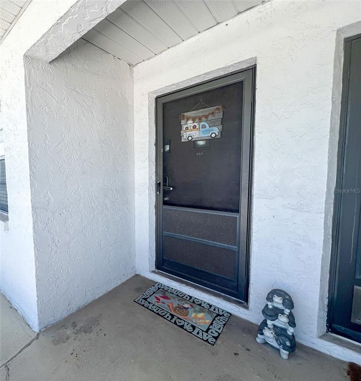 a view of empty room with front door