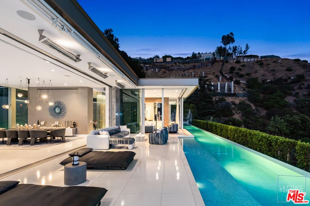 a view of a patio with couches table and chairs