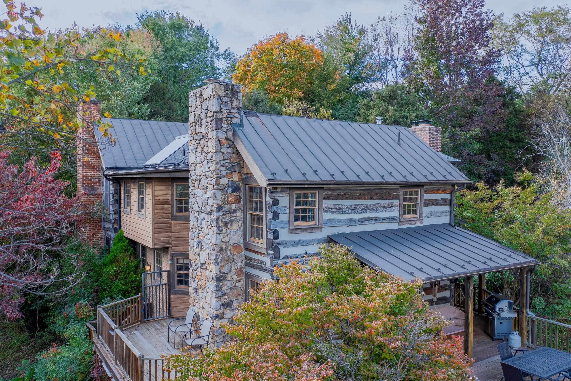 f you are a log cabin enthusiast, this creative merger of two historic log homes (1780's and 1860) will be super-attractive to you.