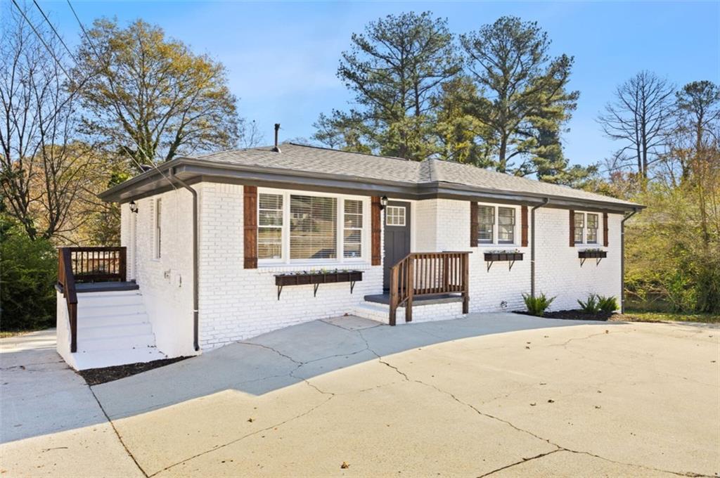 a front view of a house with a patio