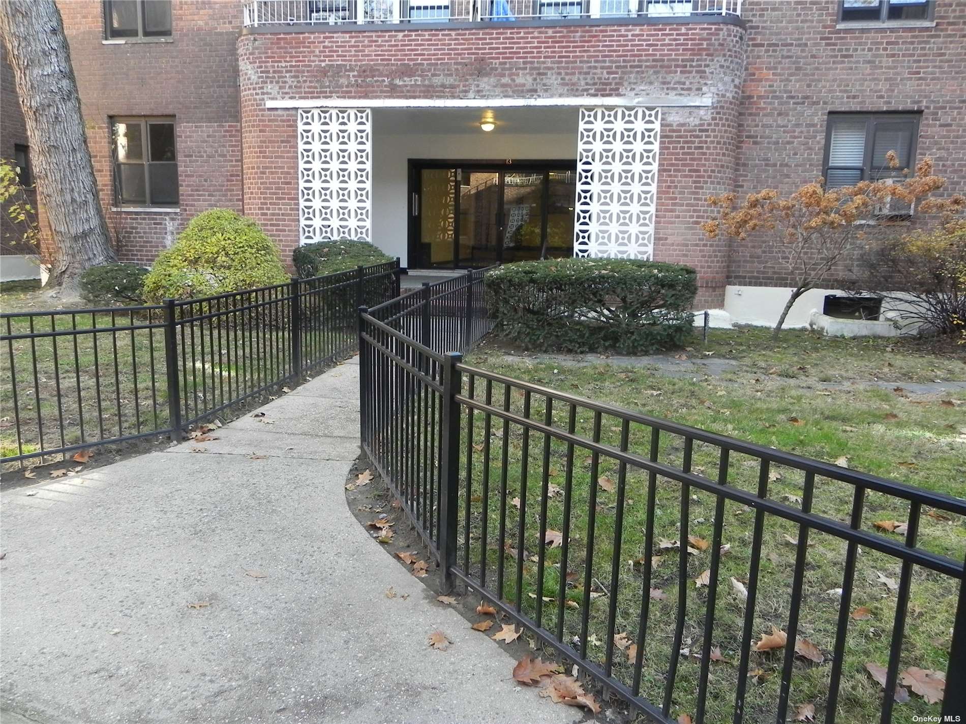 a balcony view with a garden space