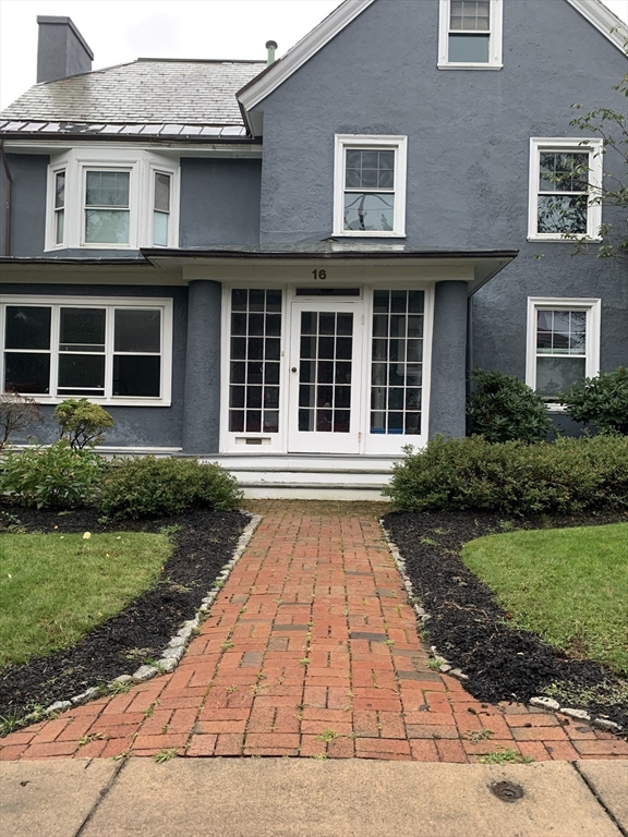 a front view of a house having yard