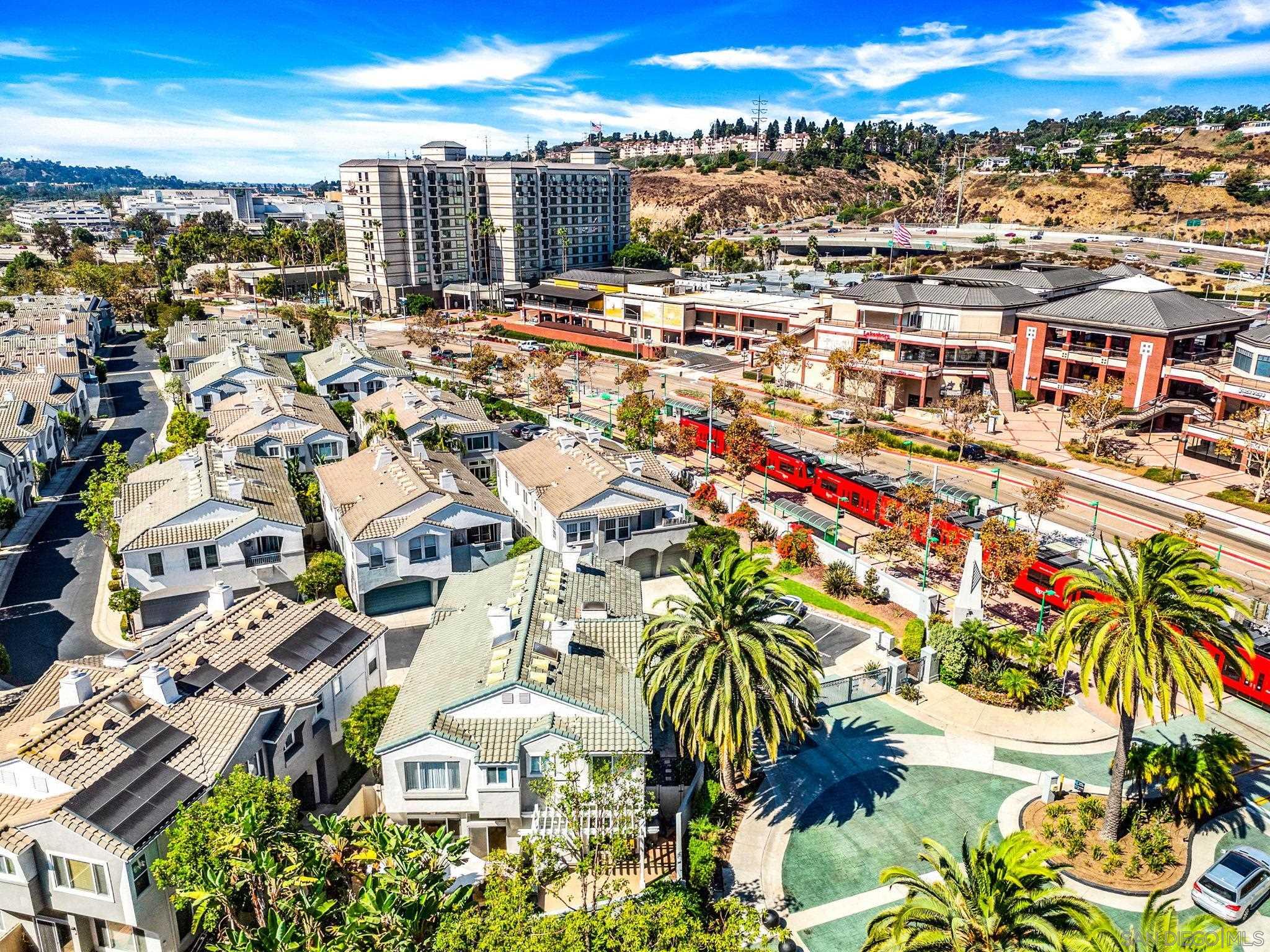 an aerial view of residential building and parking space