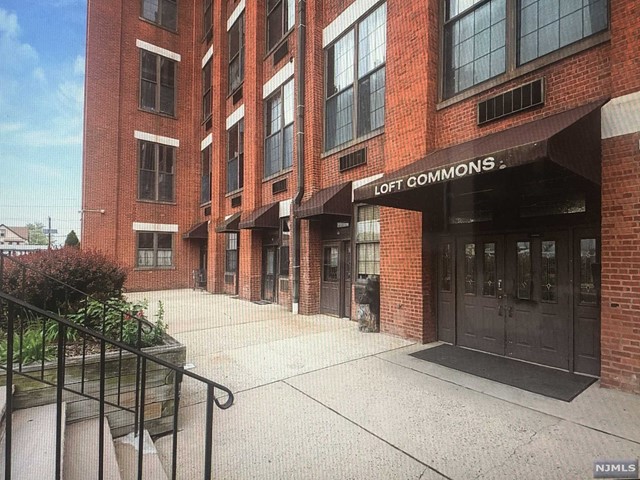 a building with a sink and glass door