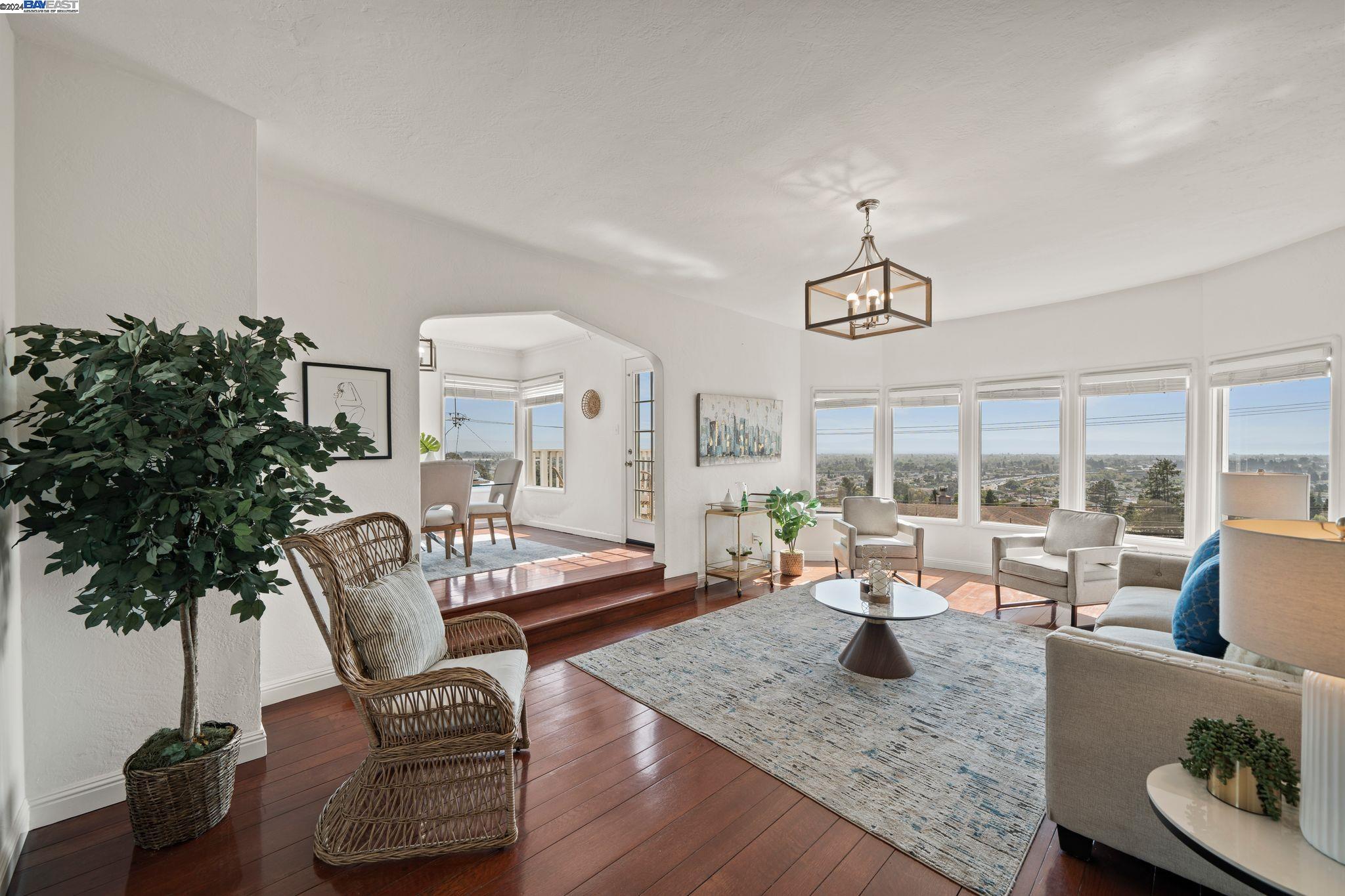 a view of a living room and dining room