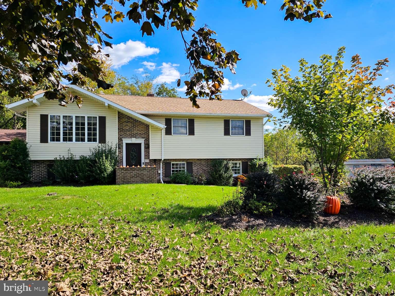 a house view with a garden space