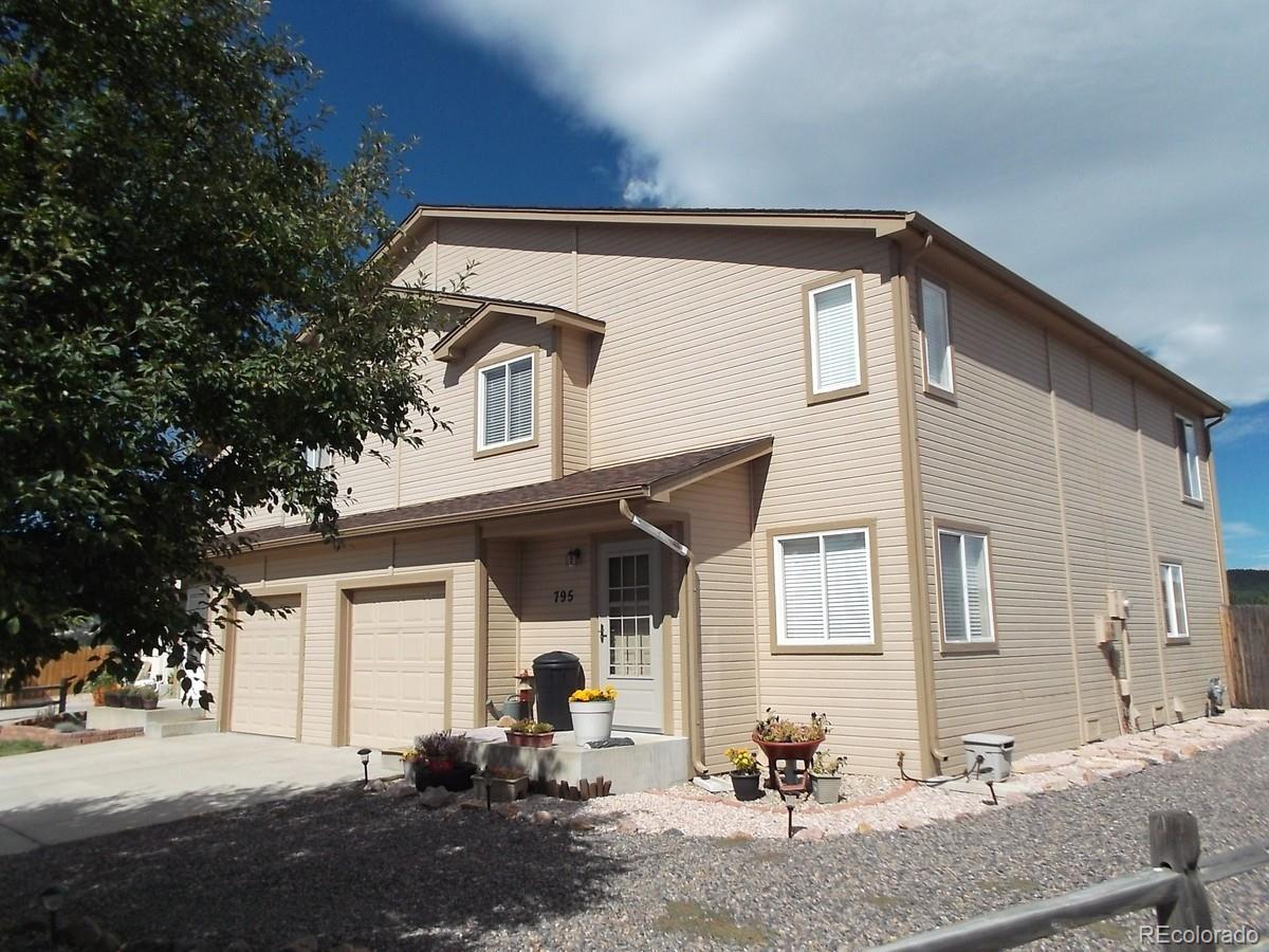 a view of a house with a patio