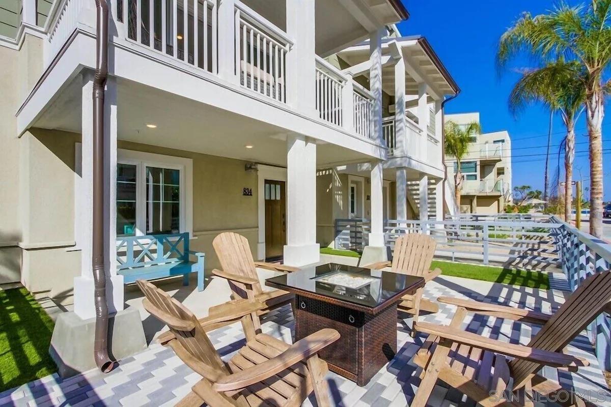 a view of a chairs and table in a patio