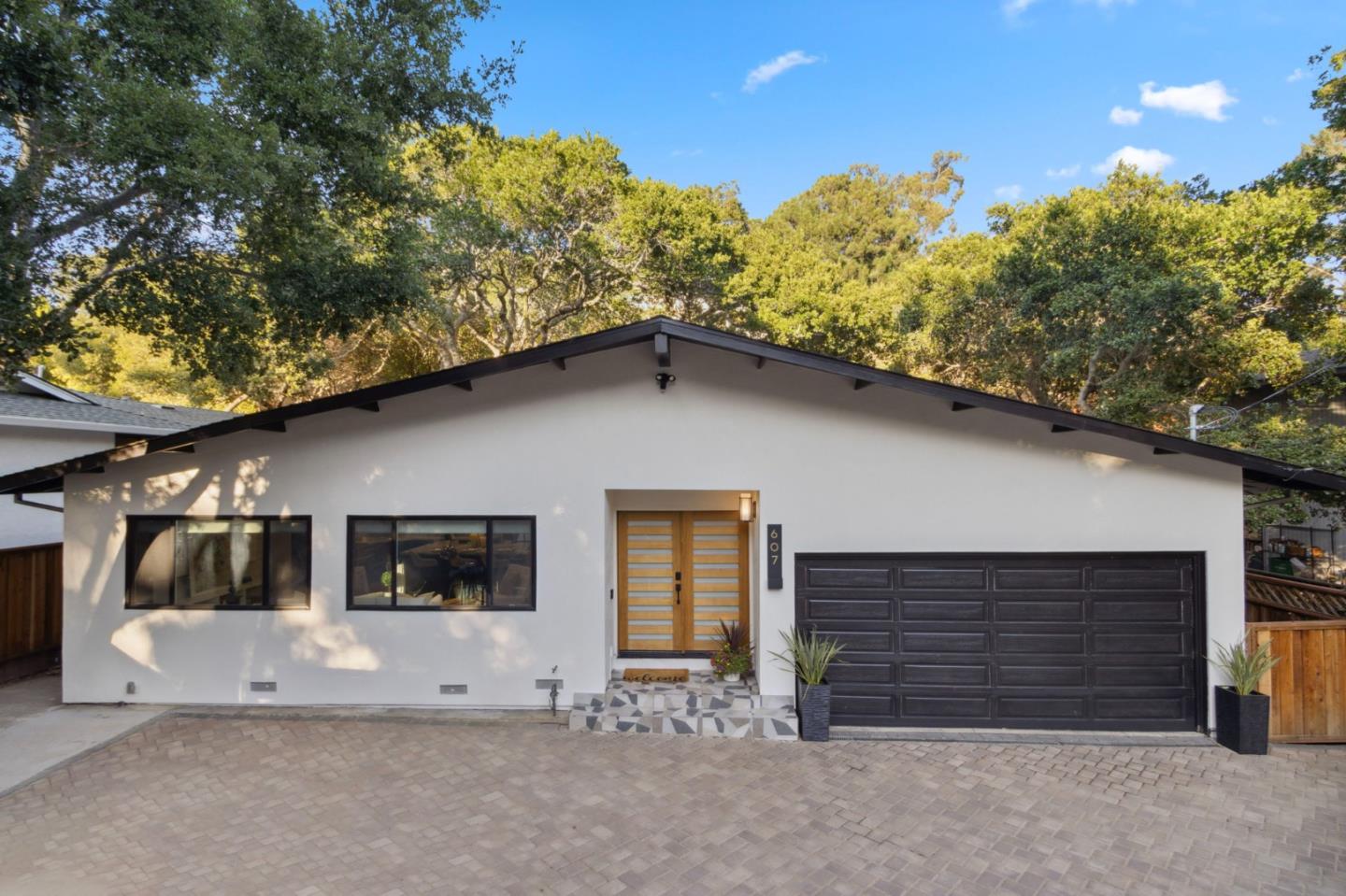 a house with trees in the background