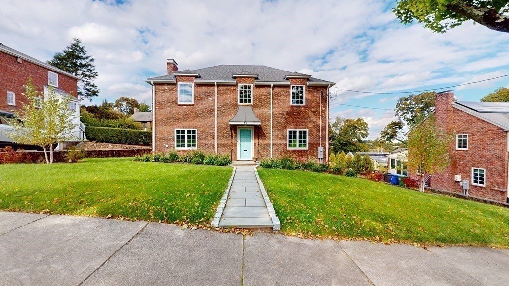 a front view of house with yard