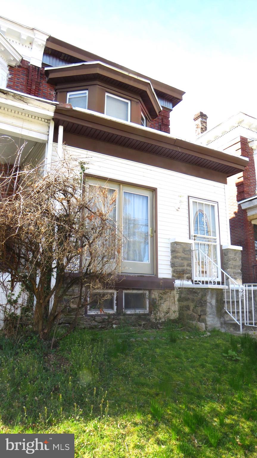 a view of a house with a large window