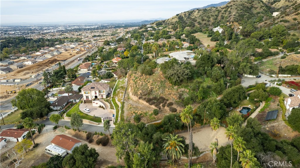 an aerial view of residential house with parking space