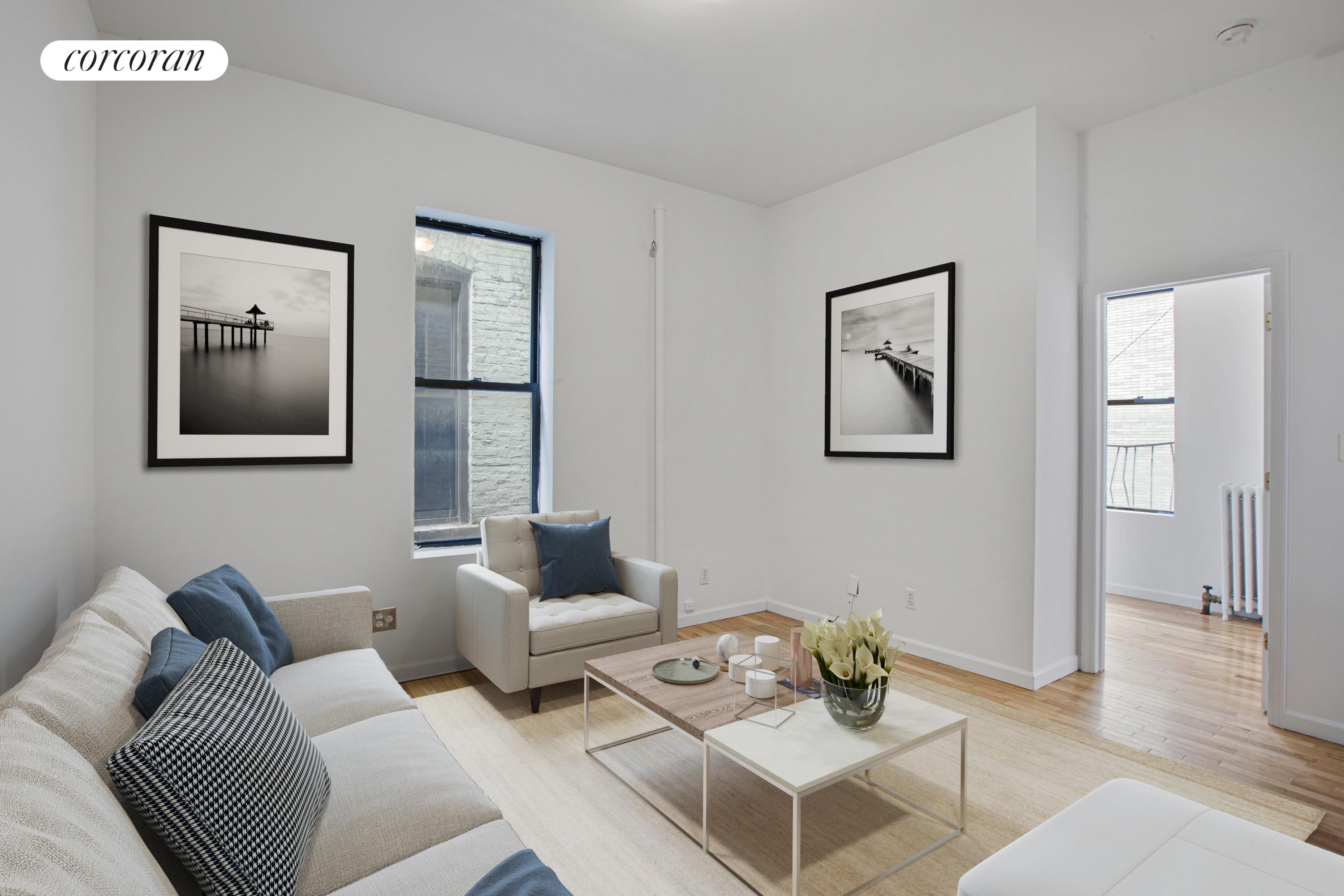 a living room with furniture and window