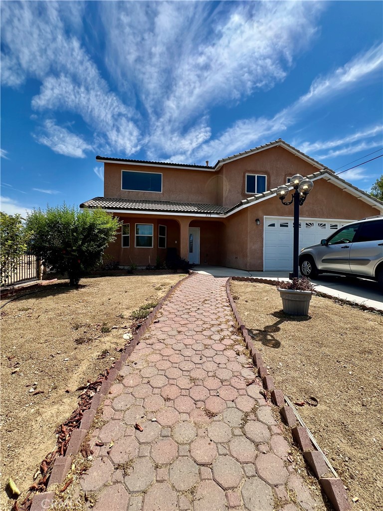 a front view of house with yard