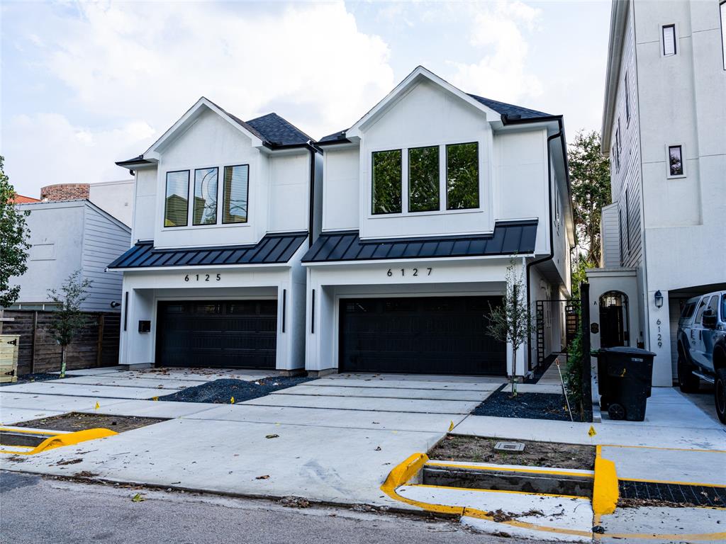 a front view of a house with entertaining space