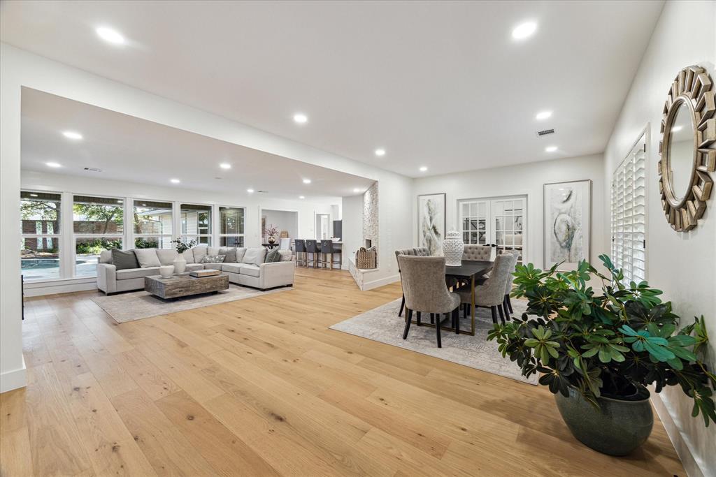 a living room with furniture potted plant and a potted plant