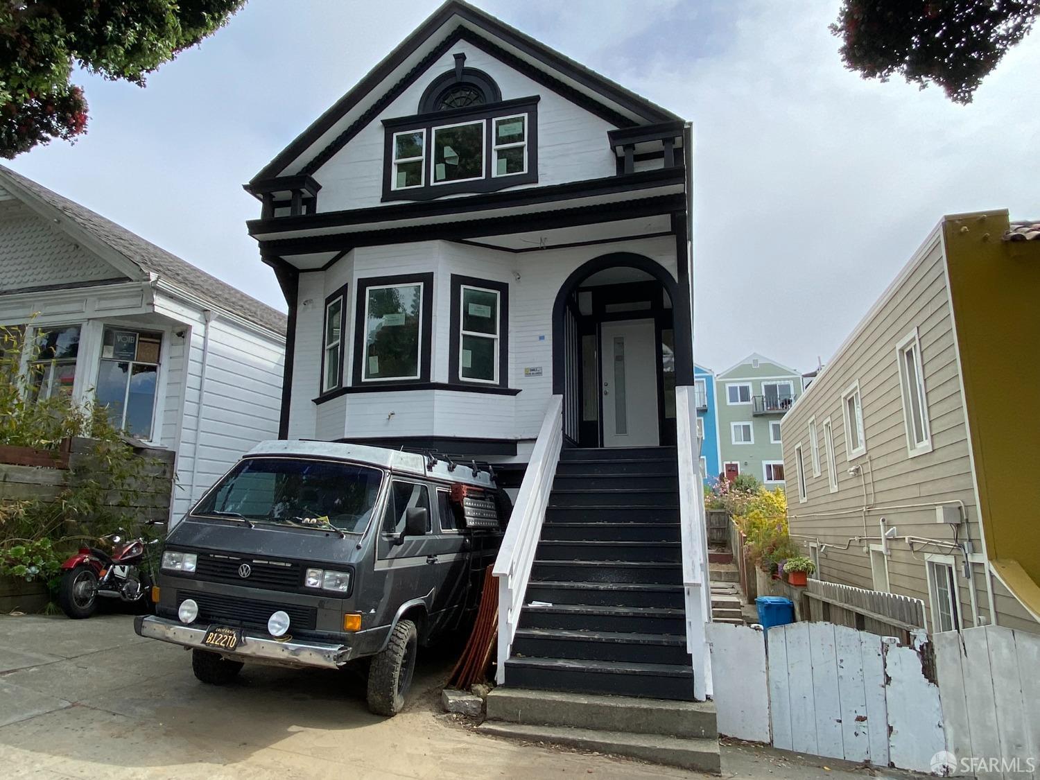 a car parked in front of a house