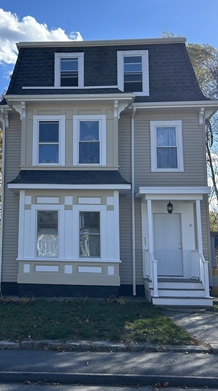 a view of a house with a garden