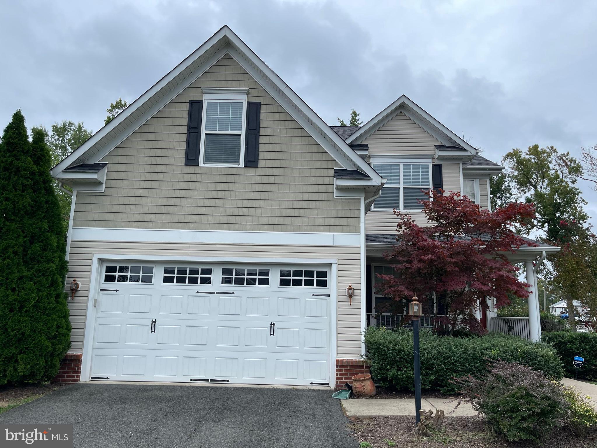 a front view of house with a yard