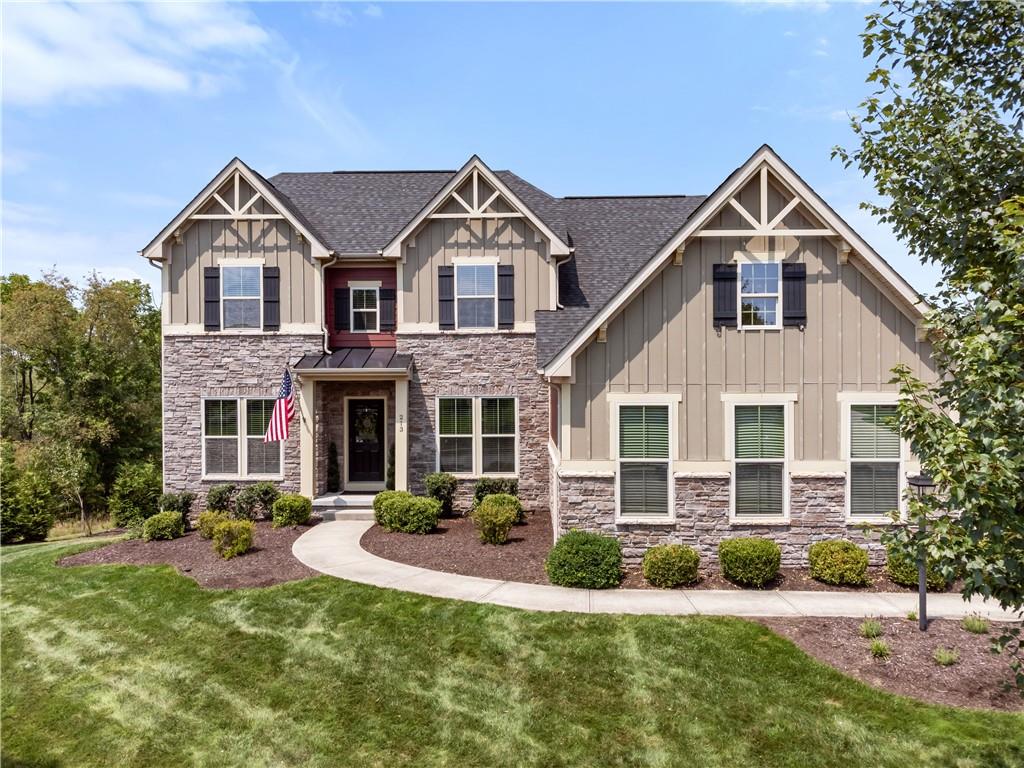 Truly a dream come true. Hardie board siding and stone. Beautiful lawn and landscaping.