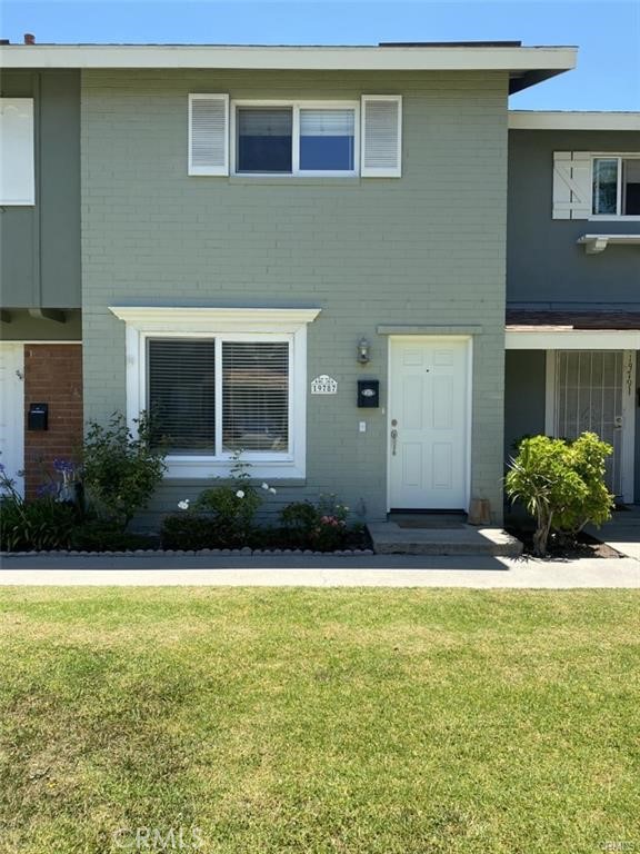 a view of house with backyard space and outdoor space