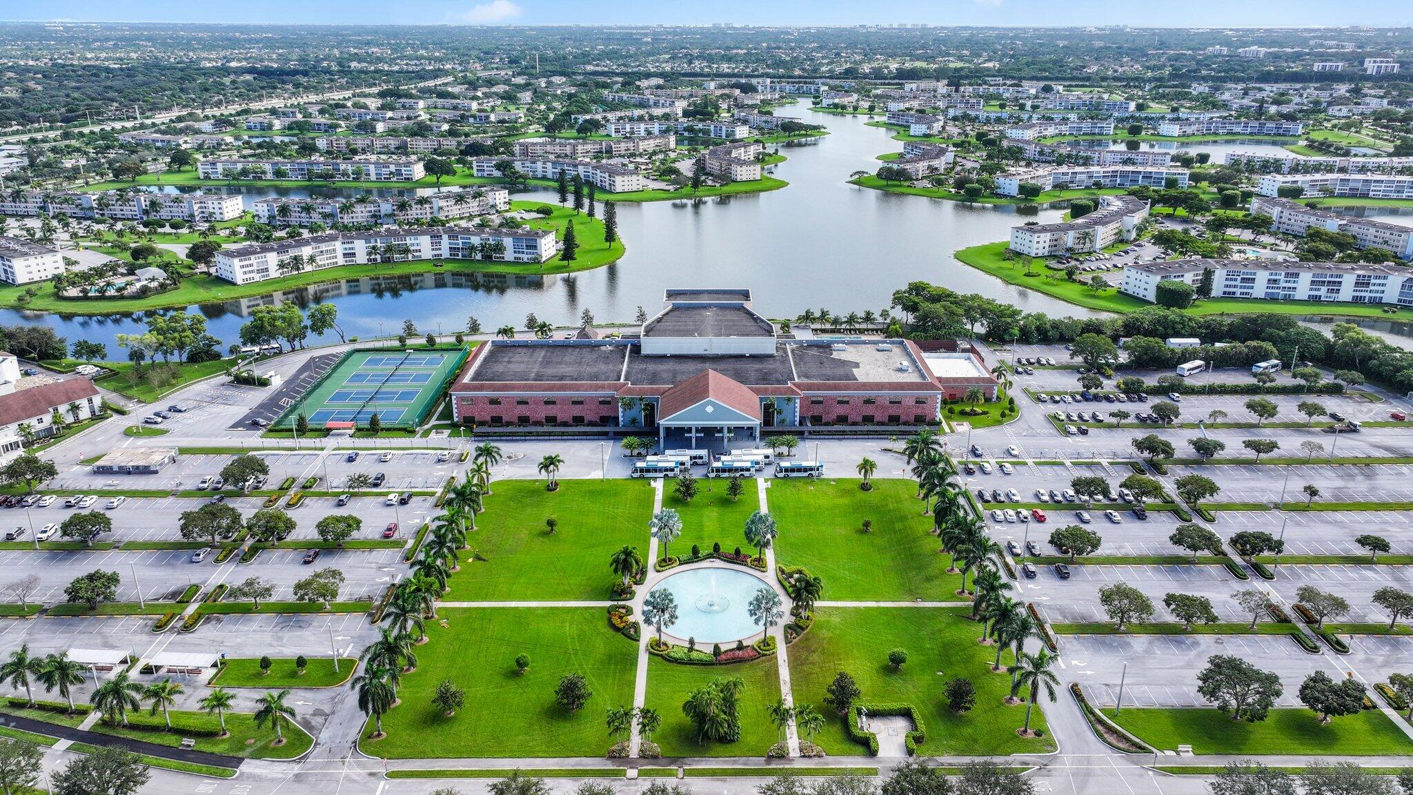 an aerial view of a houses with outdoor space and lake view