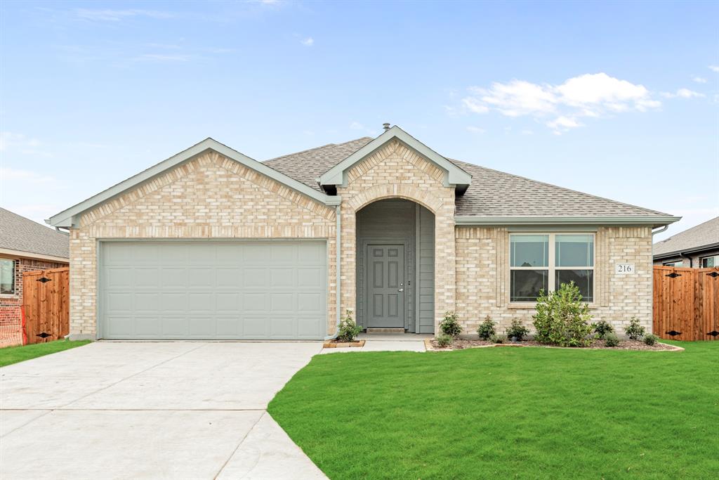 a front view of house with yard