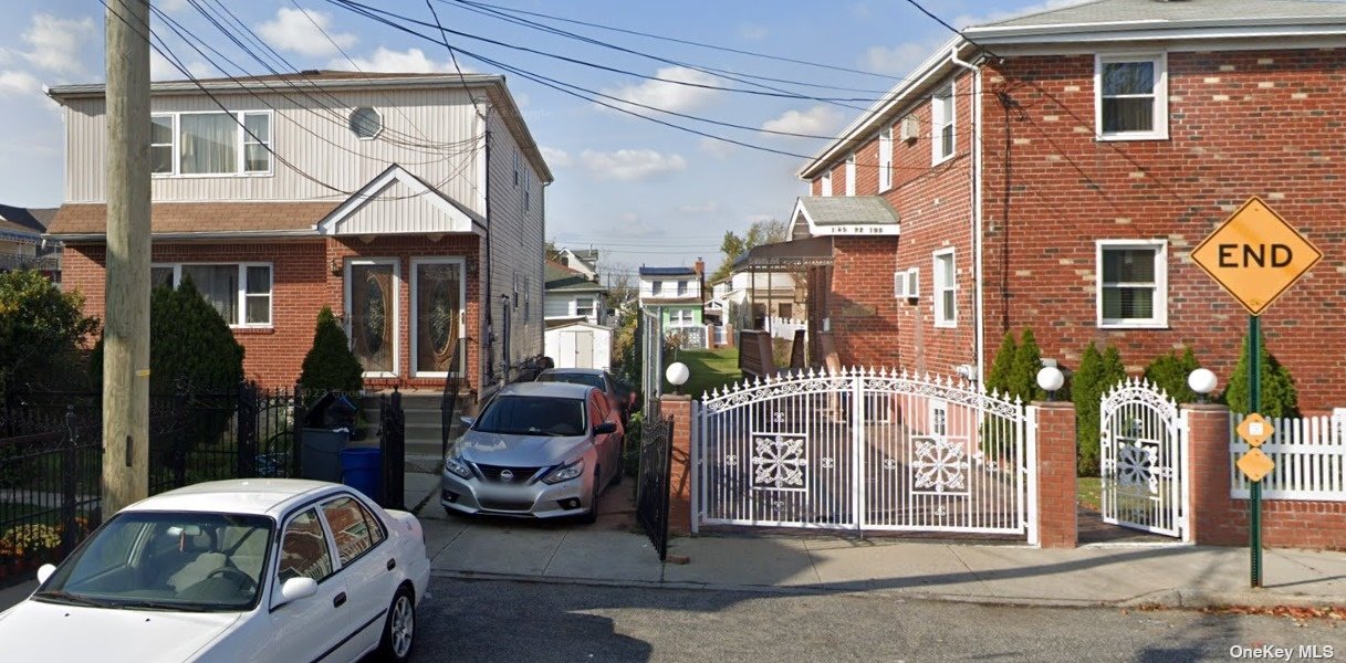 a front view of a building with street view