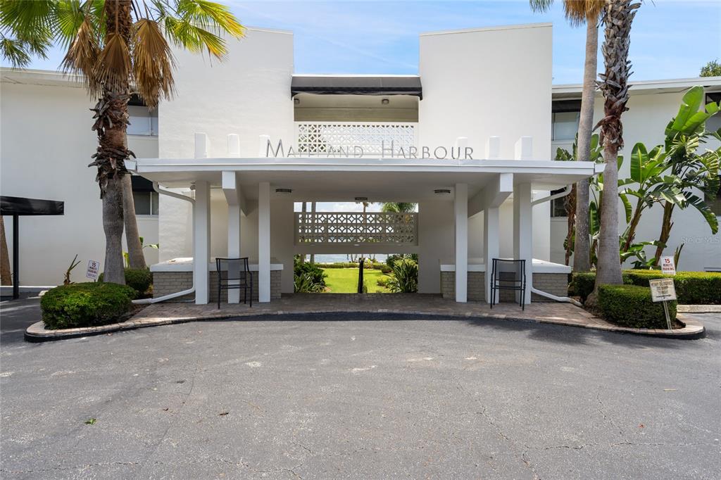 a view of a building with a garage