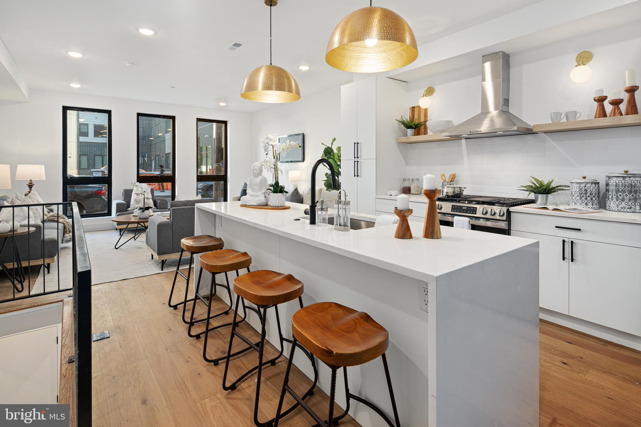 a kitchen with a sink cabinets and window