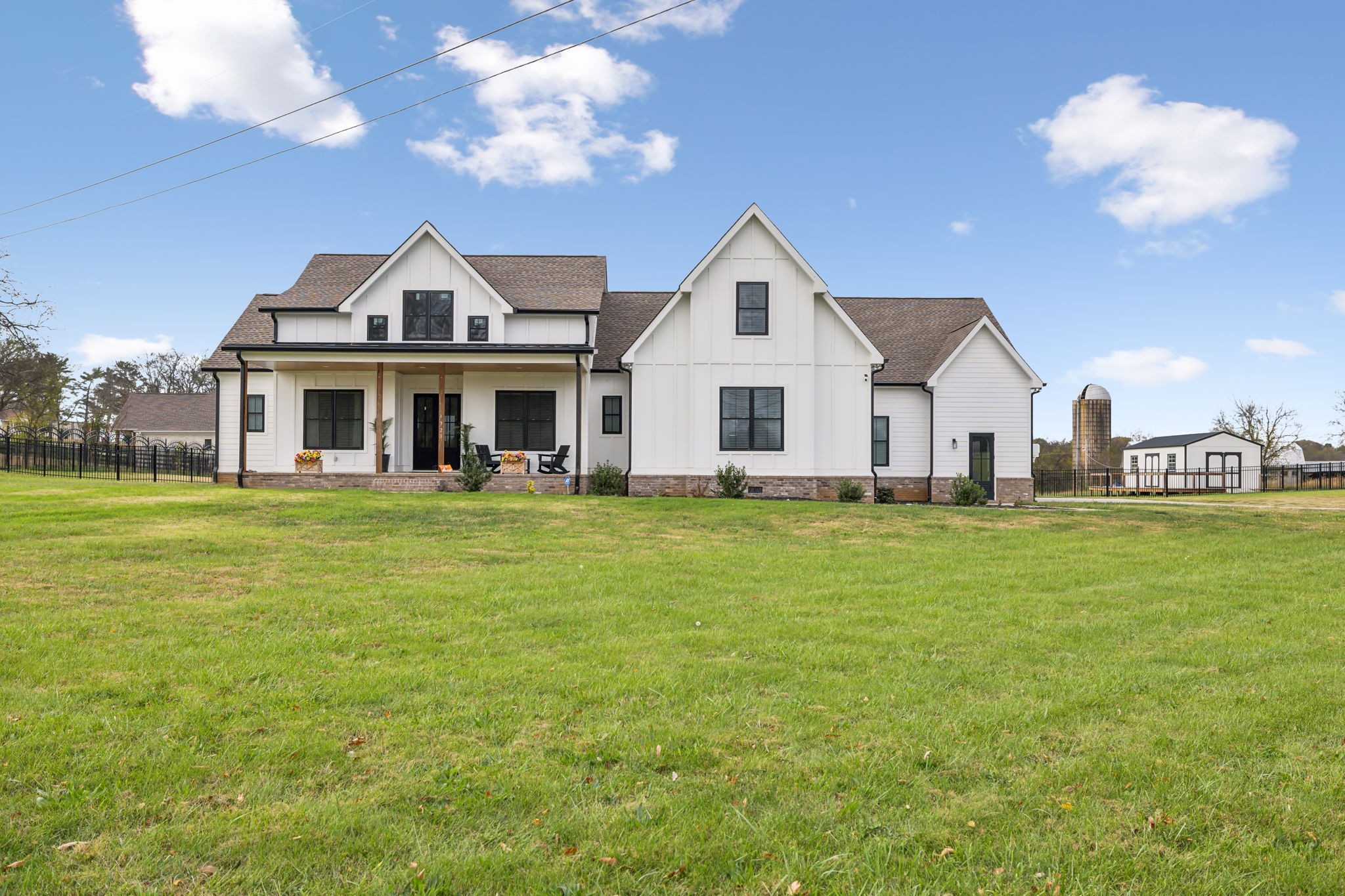 a view of a house with a big yard