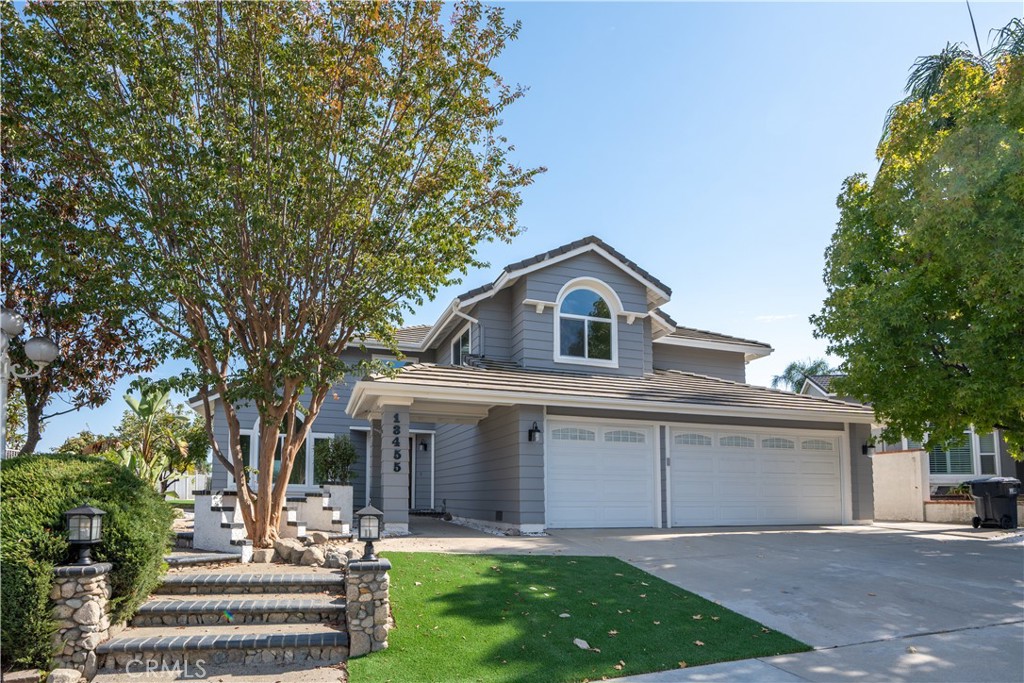 a view of house with yard outdoor seating and green space