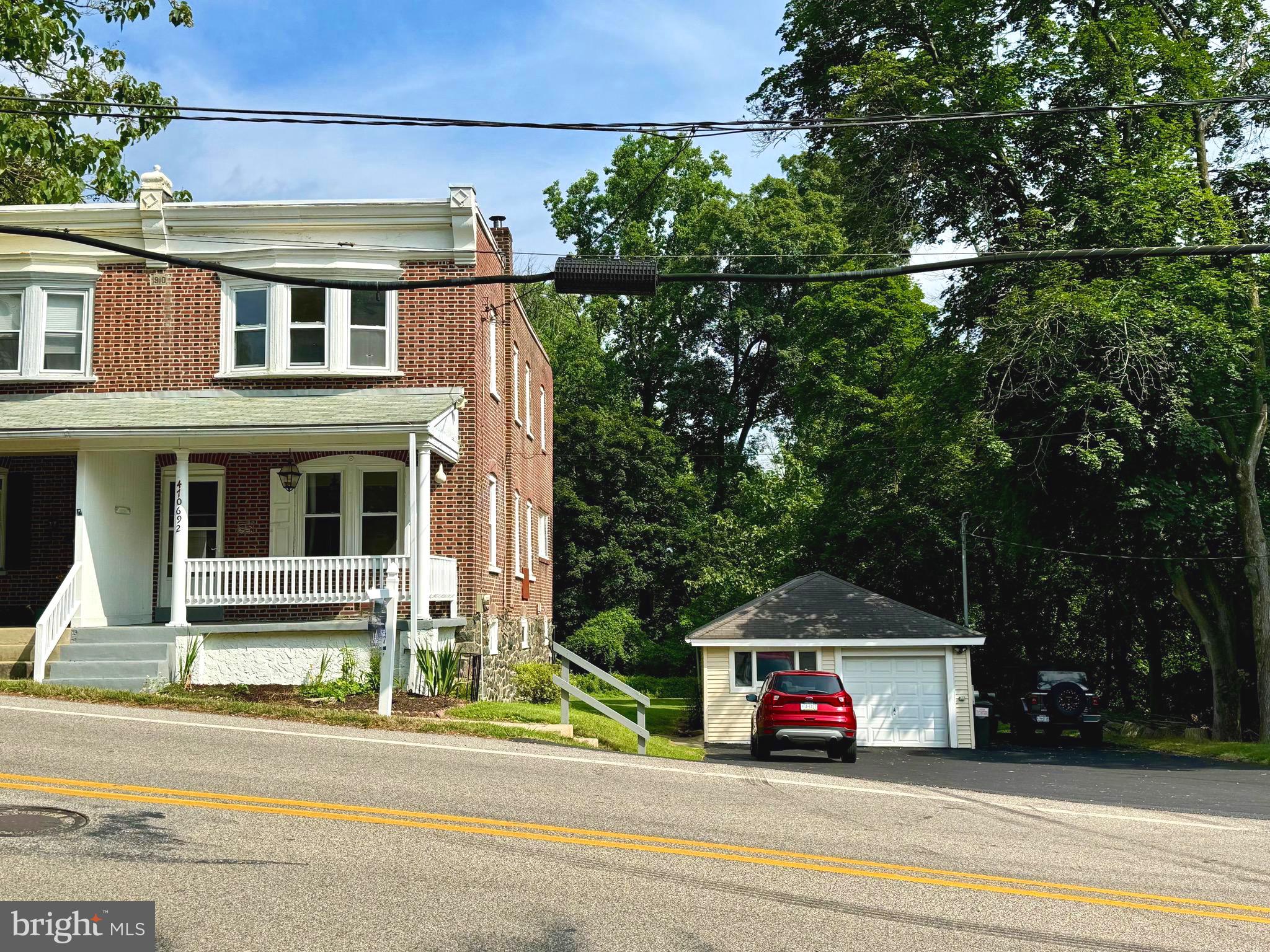 front view of a house with a small yard