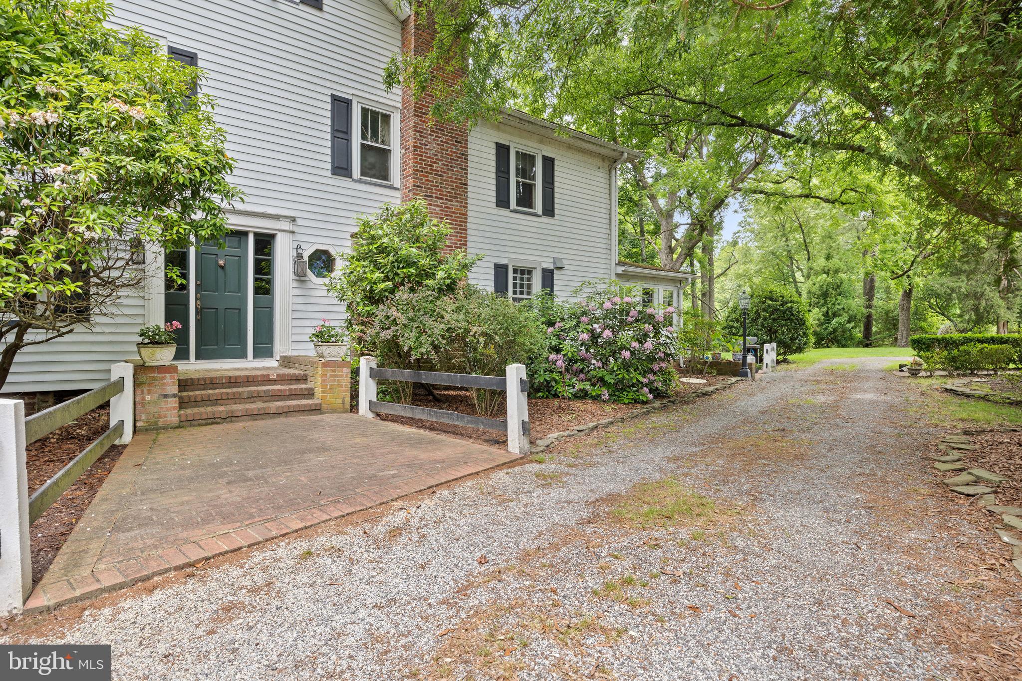 a house with trees in front of it