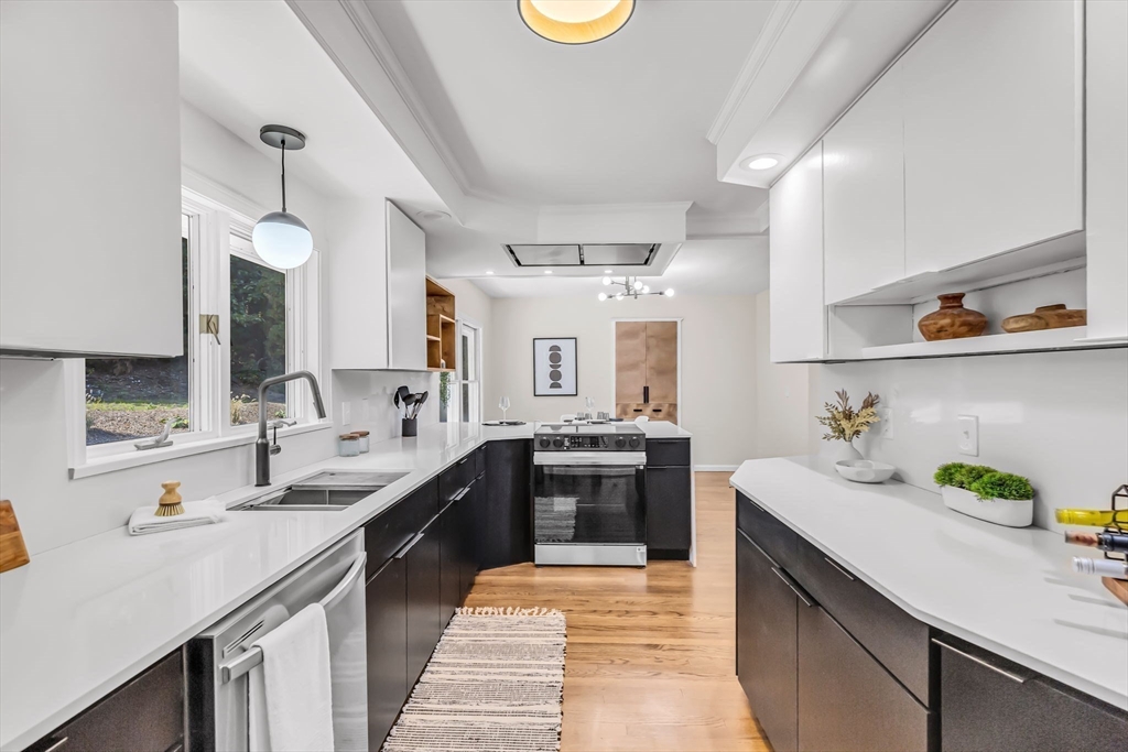 a kitchen with a sink and cabinets