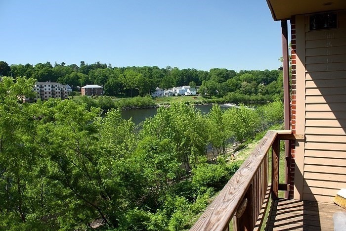 a view of a garden from a balcony