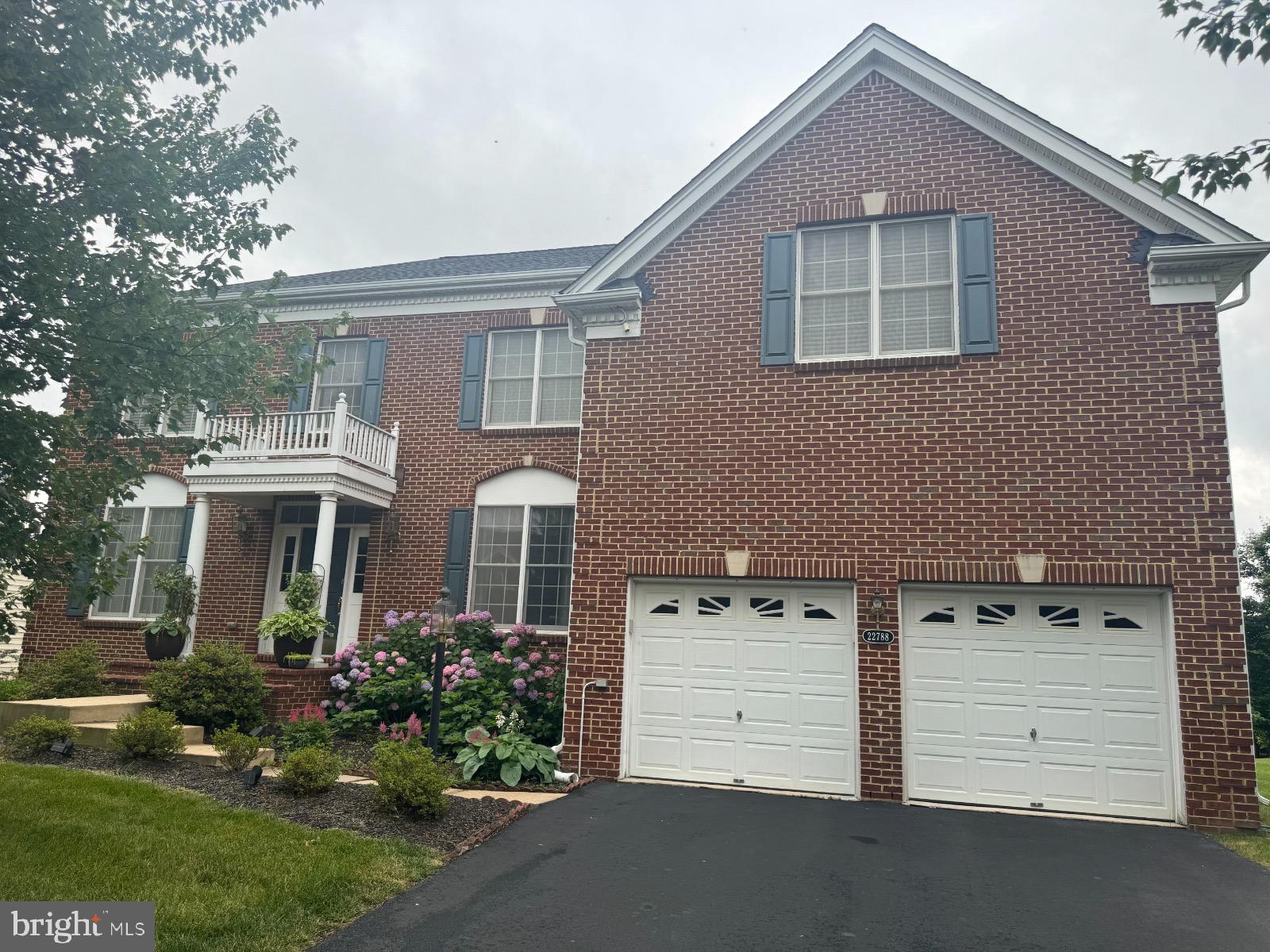 front view of house with a yard