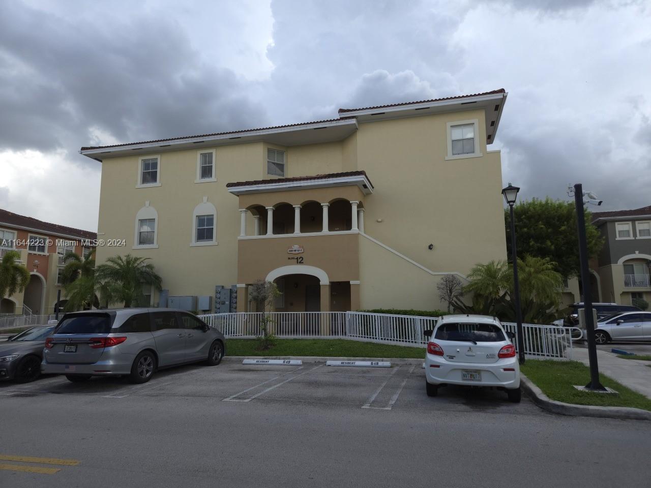 a car parked in front of a house