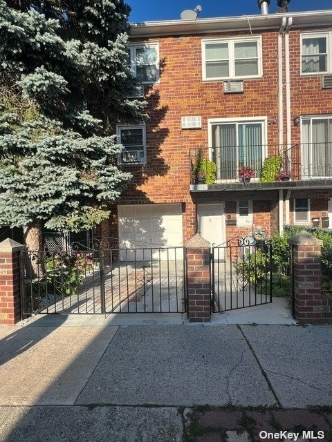 a view of building with glass door