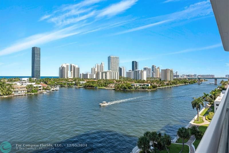 a view of a city with a lake