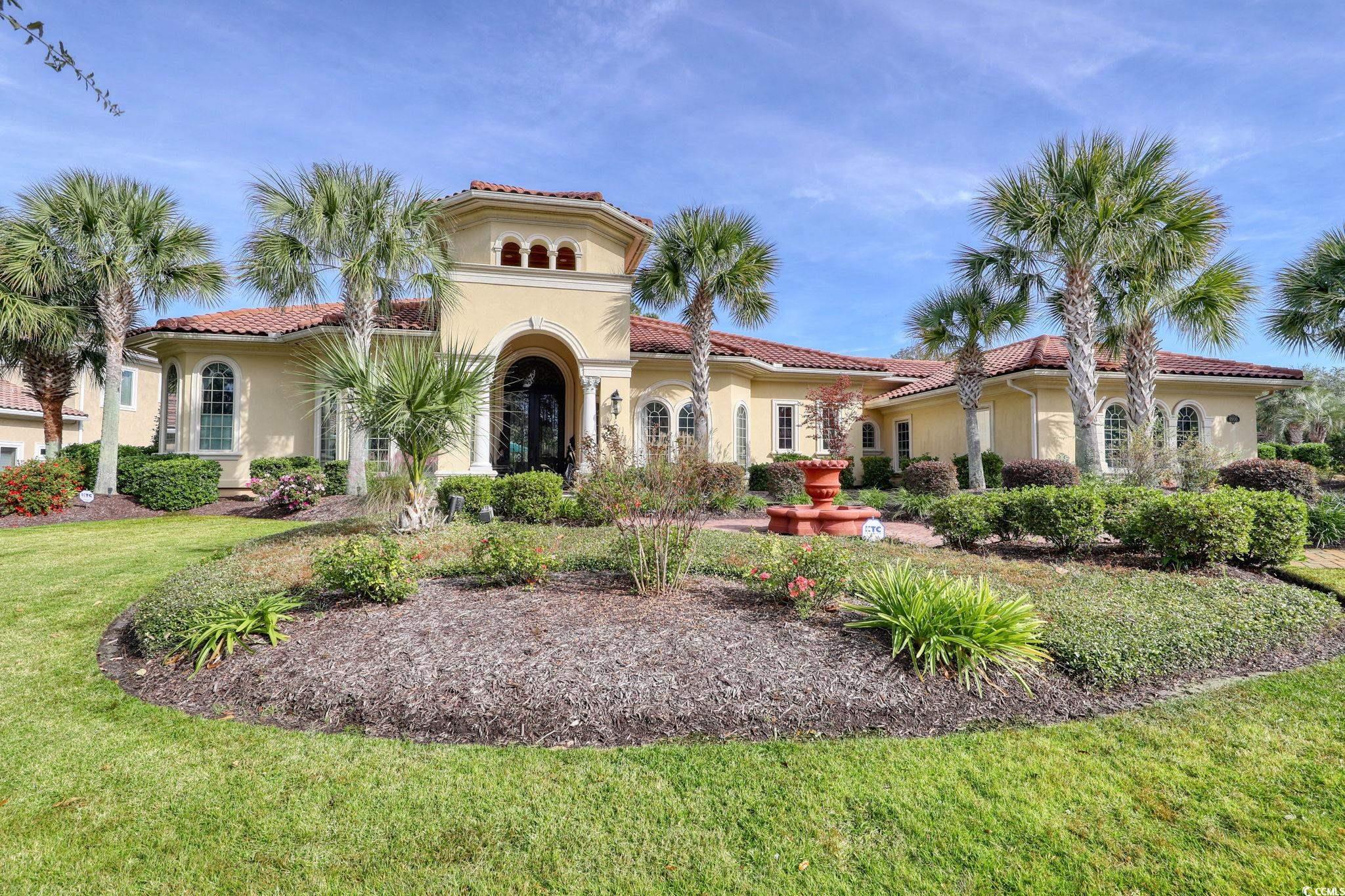 Mediterranean / spanish-style home featuring a fro