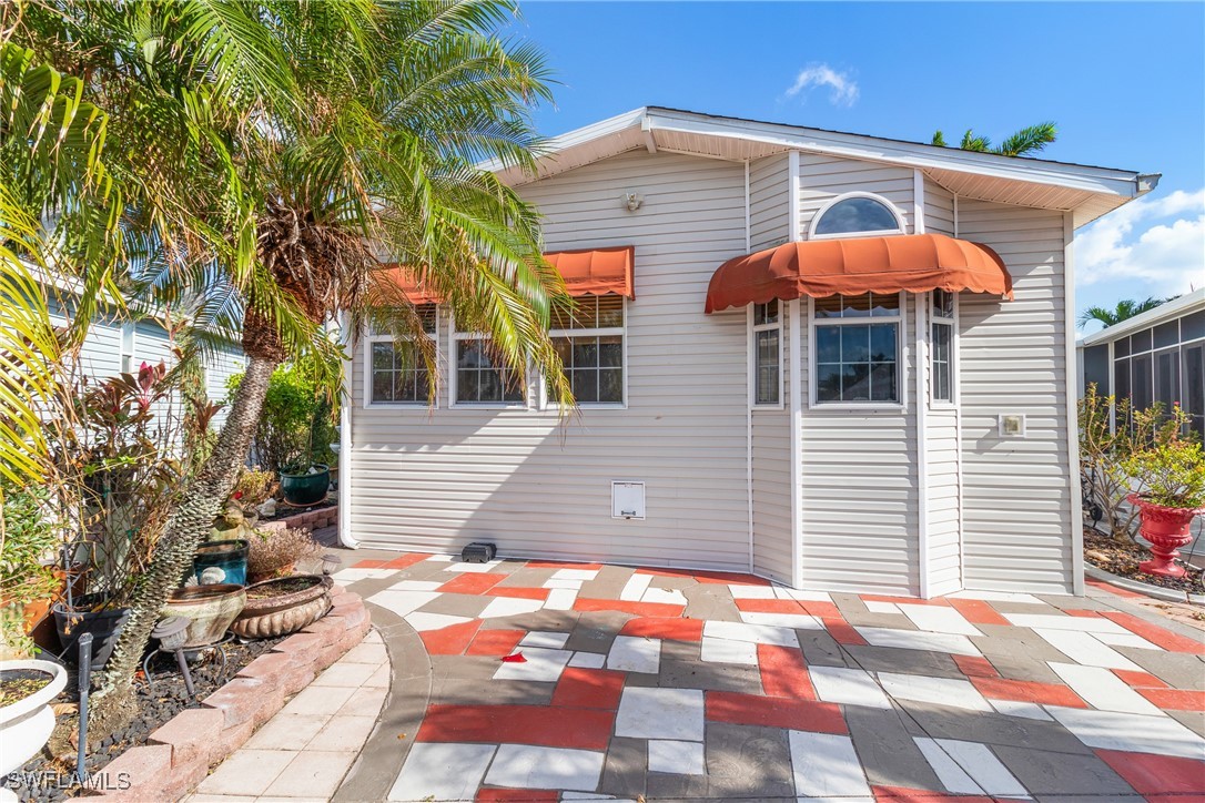 a front view of a house with patio