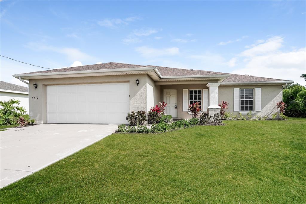 front view of house with a yard