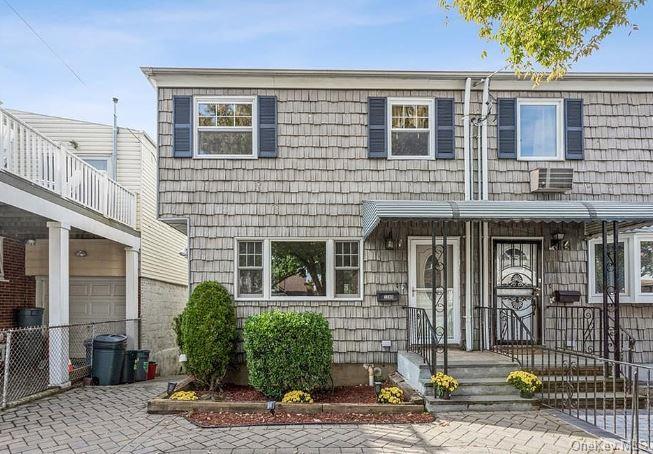 View of front of home featuring a garage