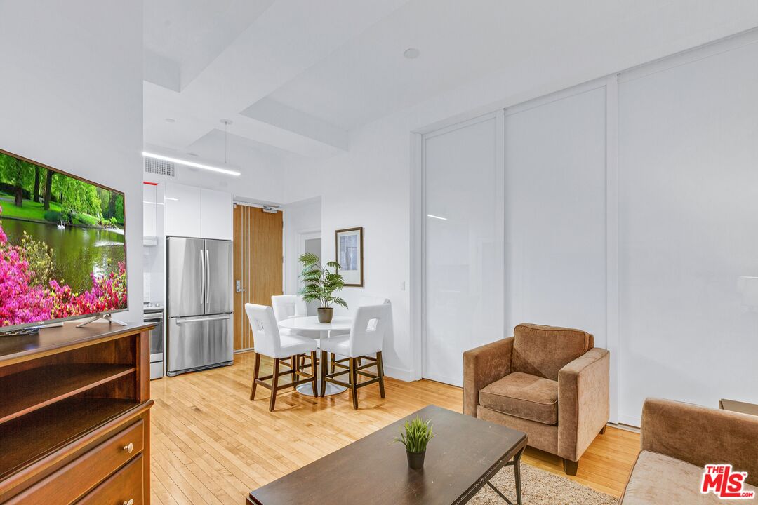 a living room with furniture and a gate