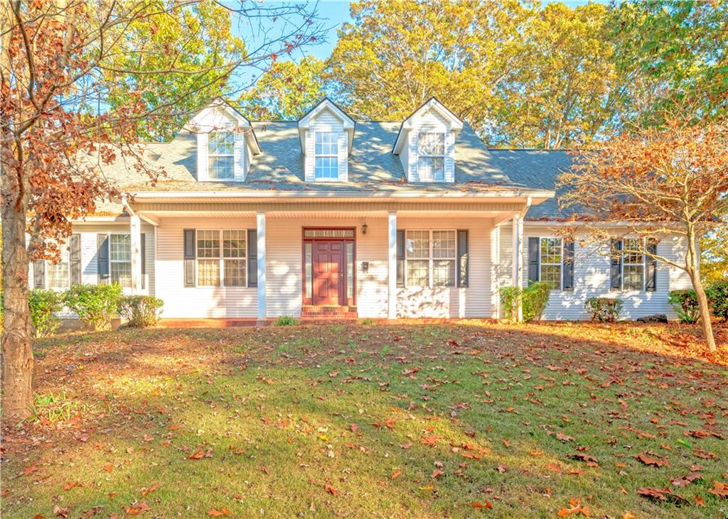 front view of a house with a big yard