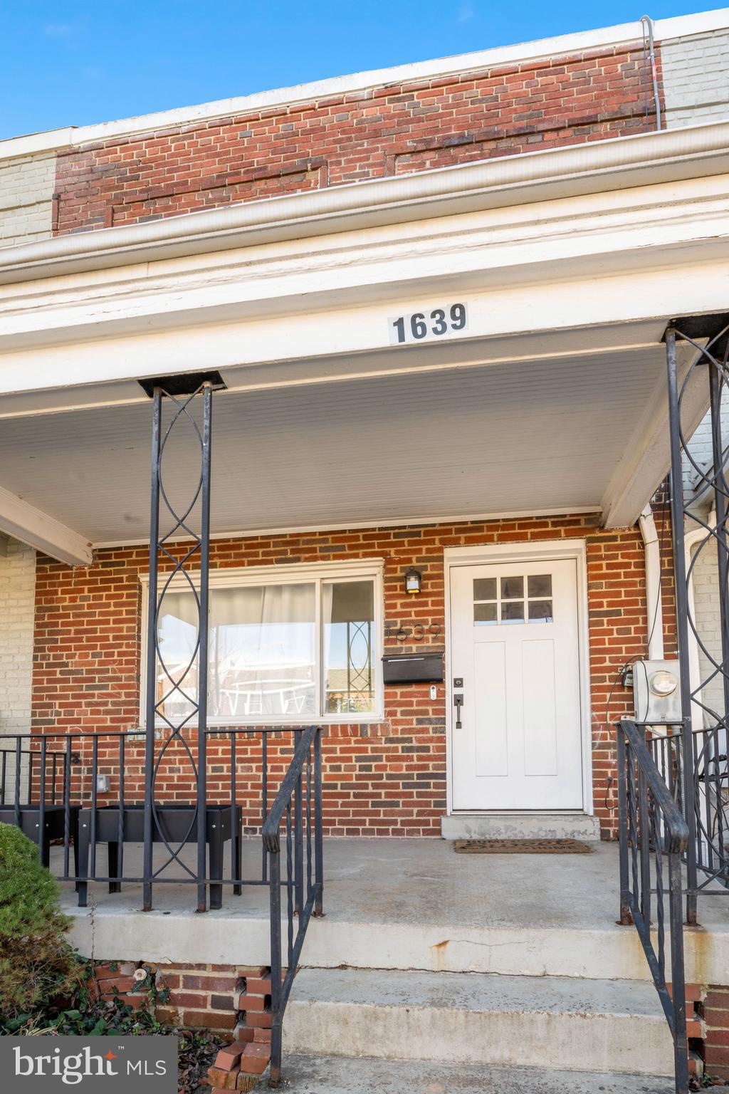 a view of a entryway door front of house